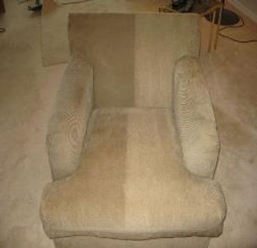 A dirty chair in yellow color in a house