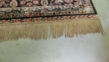 A designer mat with some designs on the ground