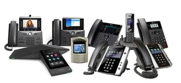 Various modern office desk phones with digital displays and keypads.