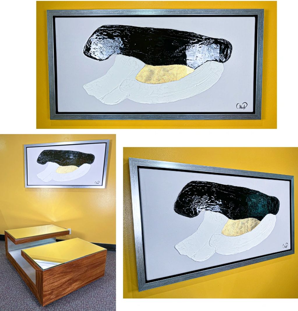 Large production artwork with silver leaf frame.