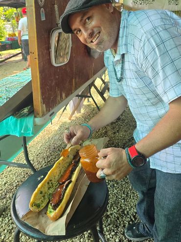 Happy customer making a sandwich