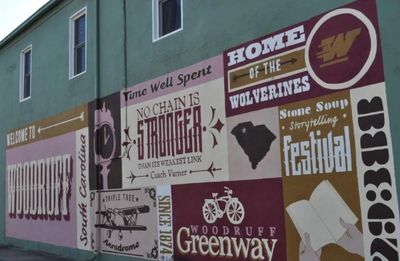 Mural featuring Woodruff, South Carolina, with community themes.