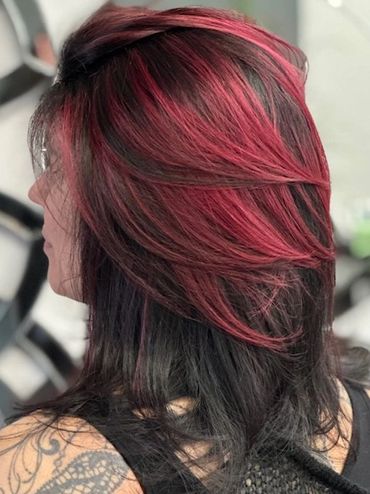 Crimson red highlights on dark brunette