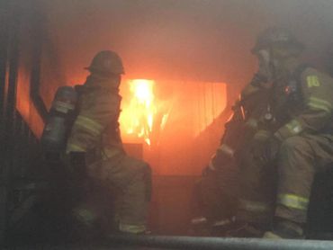 Franklin County Firefighters watching a fire.