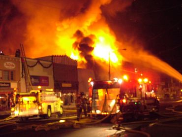 Franklin County Firefighters putting out a fire in downtown Preston Idaho