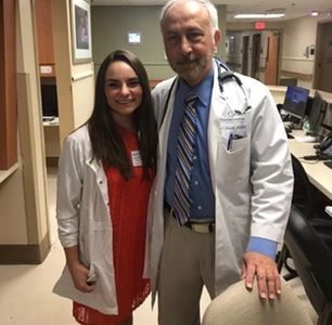 Dietitian Jackie working with a Cardiologist at a hospital.