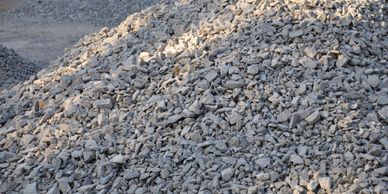 Pile of crushed stones or gravel.
