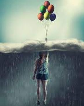 Girl holding onto balloons lifting her above the rain.