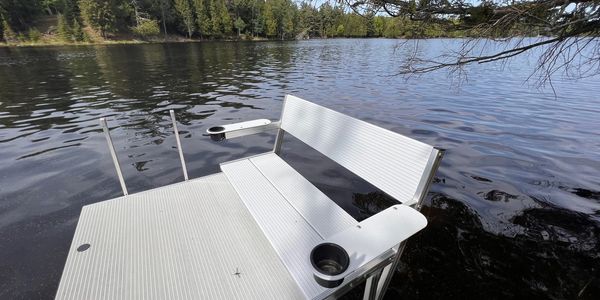 fishing swimming dock boat slip aluminum boat and oars