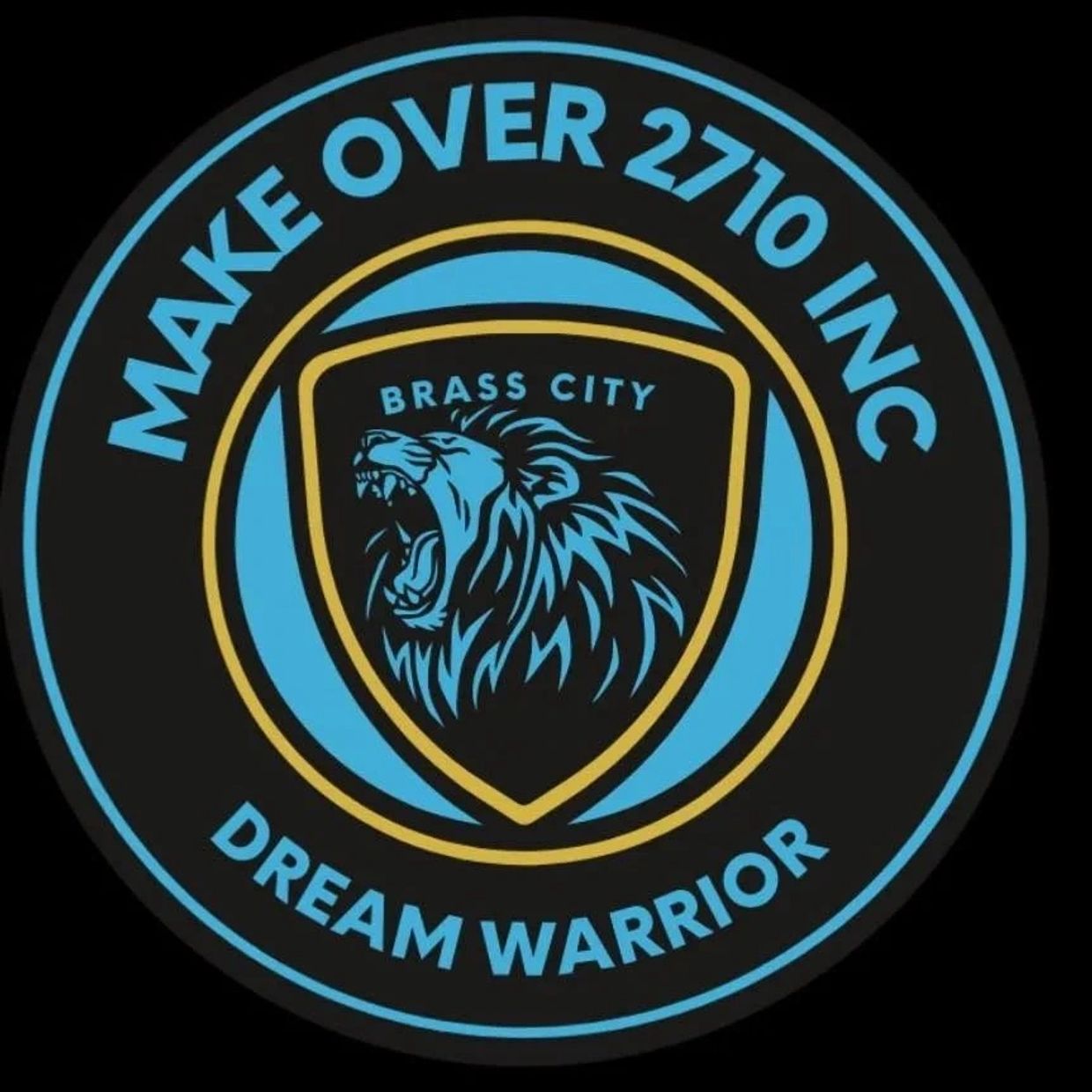 Circular emblem with a roaring lion and the text 'MAKE OVER 2710 INC' and 'DREAM WARRIOR'.