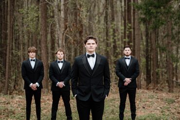 Groom and groomsmen in a forest wedding South Carolina