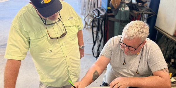 Fabric8ed team planning the next fabrication, engineering for a Groveland project.