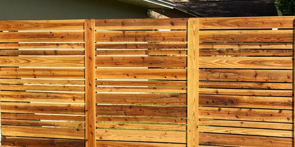 Fabric8ed cedar fence installed in Minneola