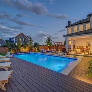 A luxury Coronado home featuring a modern backyard, pool, and coastal indoor–outdoor lifestyle.