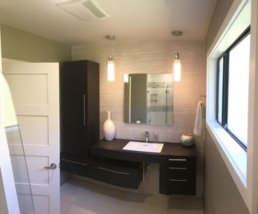 Bathroom updates include lighting, cabinets, and windows.