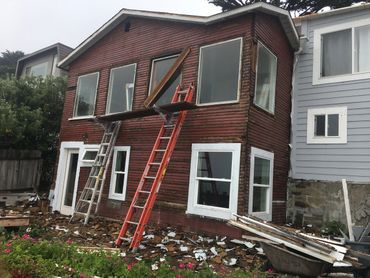 Established home remodel, enlarging windows and adding valances.