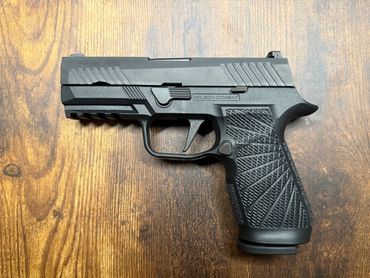 Sig Sauer P320 Carry - 9mm
New Wilson Combat Grip Module.
New Straight Trigger - Tuned
3 Mags - Or