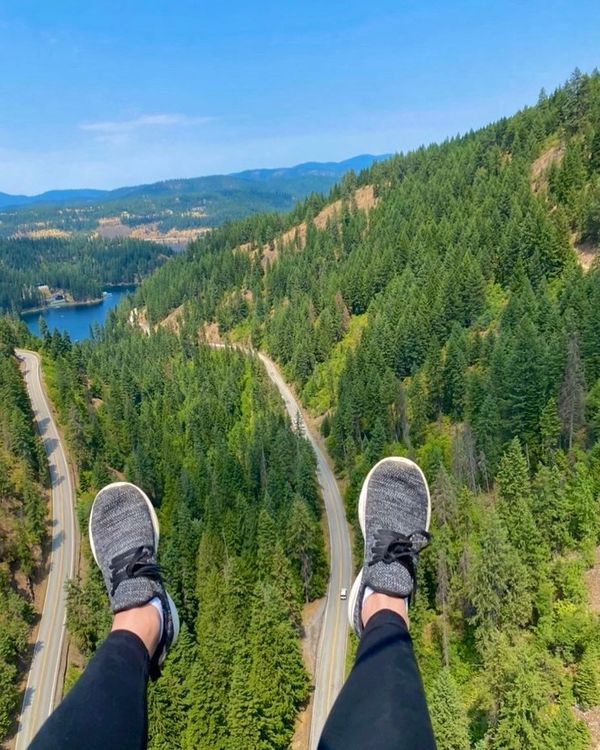 view of Feet dangling over zip line