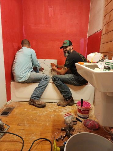 Renovated bathroom with fresh paint, upgraded vanity, shower upgrade & updated lighting fixtures.