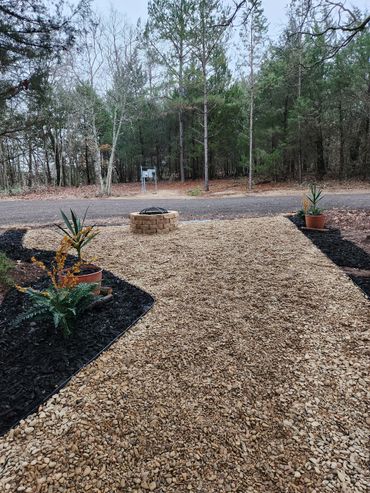 Fire pit lounging area, landscape renovation mulching brush removal
