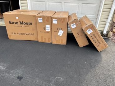 New couch unwrap assemble and discard of boxes in Bensalem Bucks county PA