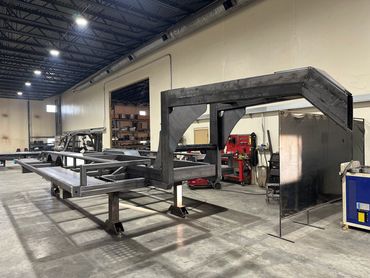 Iron Shield Industries custom-made trailer for an amphibious vehicle designed for agitating lagoons.