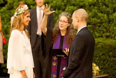 Shira Tarantino, wedding officiant, blessing a couple before their handfasting at a wedding