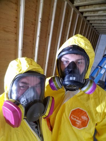 Mold removal crew members PPE Safety Spray foam insulation