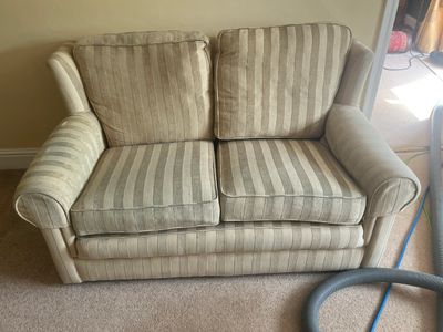 Heavily soiled armchair in Nassington near peterborough expertly cleaned by Longueville Carpet and u