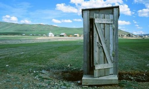 toilet outhouse at the Russia to Mongolia border in the Altai region