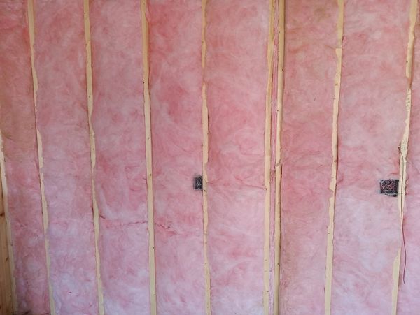 Batt insulation in open wall.
