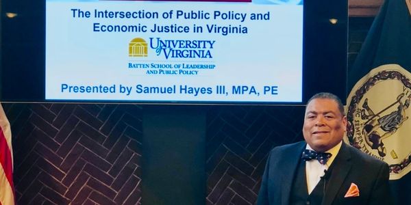 Samuel Hayes III presenting on public policy and economic justice in Virginia.