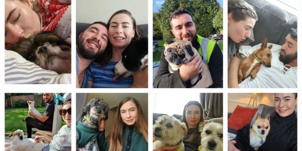People cuddling and posing with their dogs.