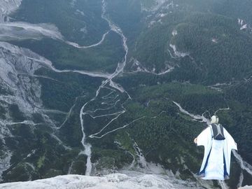 Dropzone owner Tony wingsuit base jumping the Italian mountains.