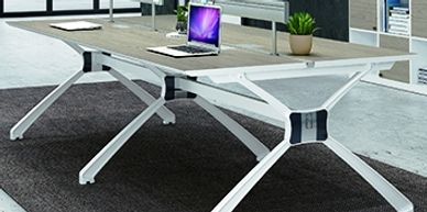 office workstations in Noida with brown table and elegant cross shaped bottom support