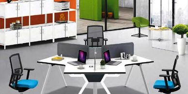 office workstations in Noida with L shape chic table top angular white legs and black color screens