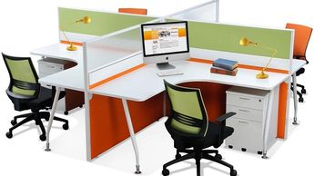 office workstations in Noida with L shape table top orange and green color partitions with glass
