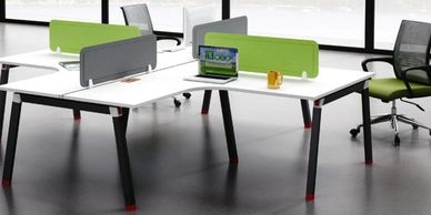 office workstations in Noida with L shape table top and green color screens