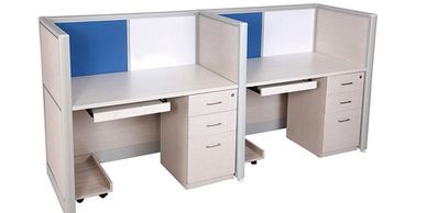 office workstations in Noida with straight table top  side by side and  blue color partitions