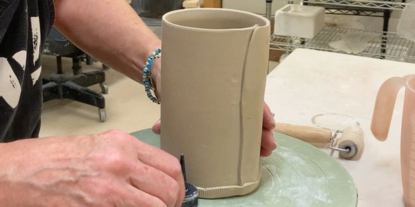 Forming a soft slab mug.