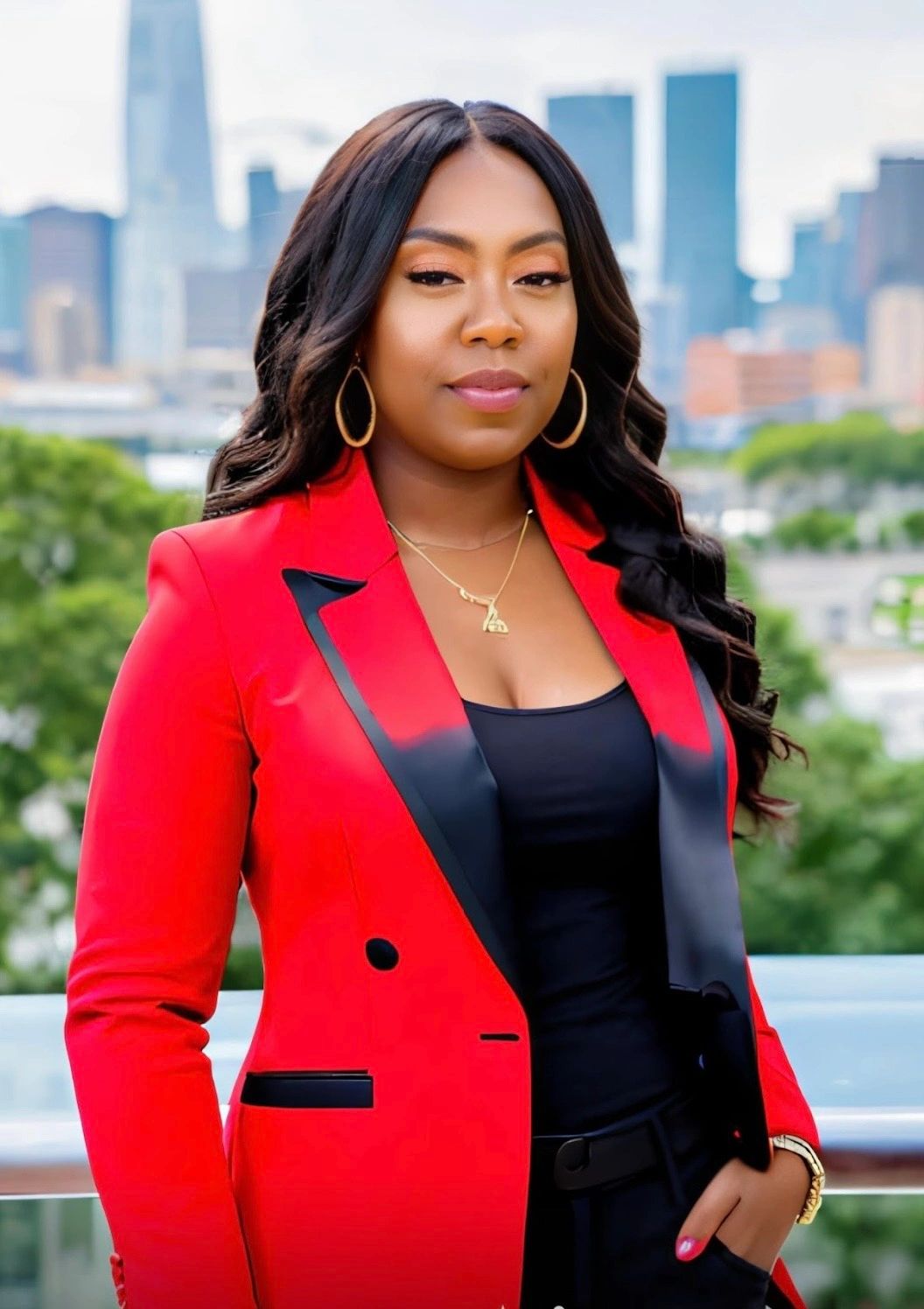 Professional portrait of Jody Bailey, founder of Jream Service, wearing a red jacket