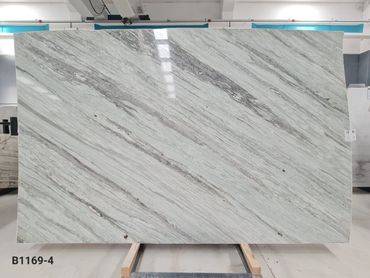 Aqua Green Marble slab with flowing natural veins for luxury architectural interiors.