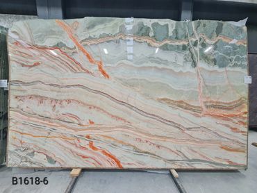 Natural Turkish Rainbow Onyx slab with rich mineral colors and polished premium surface.