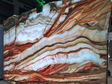 Luxury Turkish Rainbow Onyx slab featuring vibrant crystalline patterns and elegant translucency.
