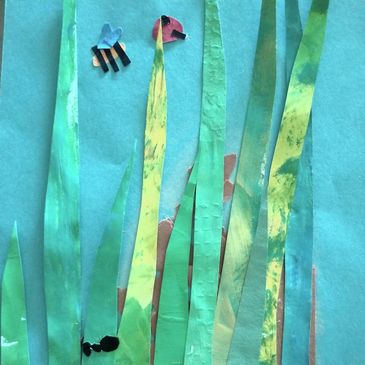 Crafted paper art of a bee and an ant amidst tall green grass.