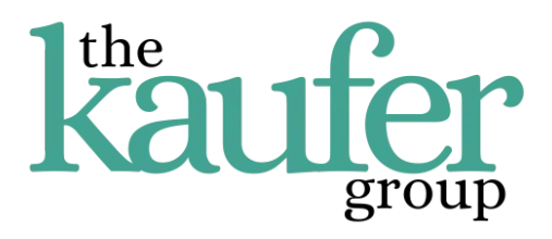 Stack of books next to pencils in a holder and a camera.