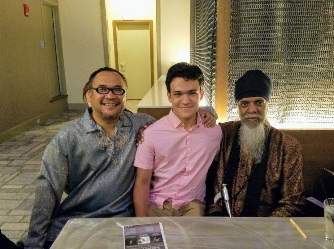 Justyn - center with Dr. Lonnie Smith - right