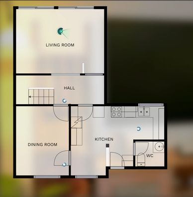 Floor plan showing living room, hall, dining room, kitchen, and WC layout.