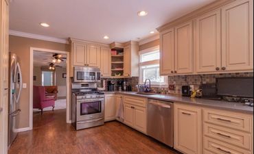 installed Laminate flooring in a kitchen remodel