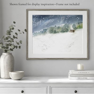 Winter’s Quiet original watercolor painting displayed as framed winter landscape wall art in a cozy neutral room.